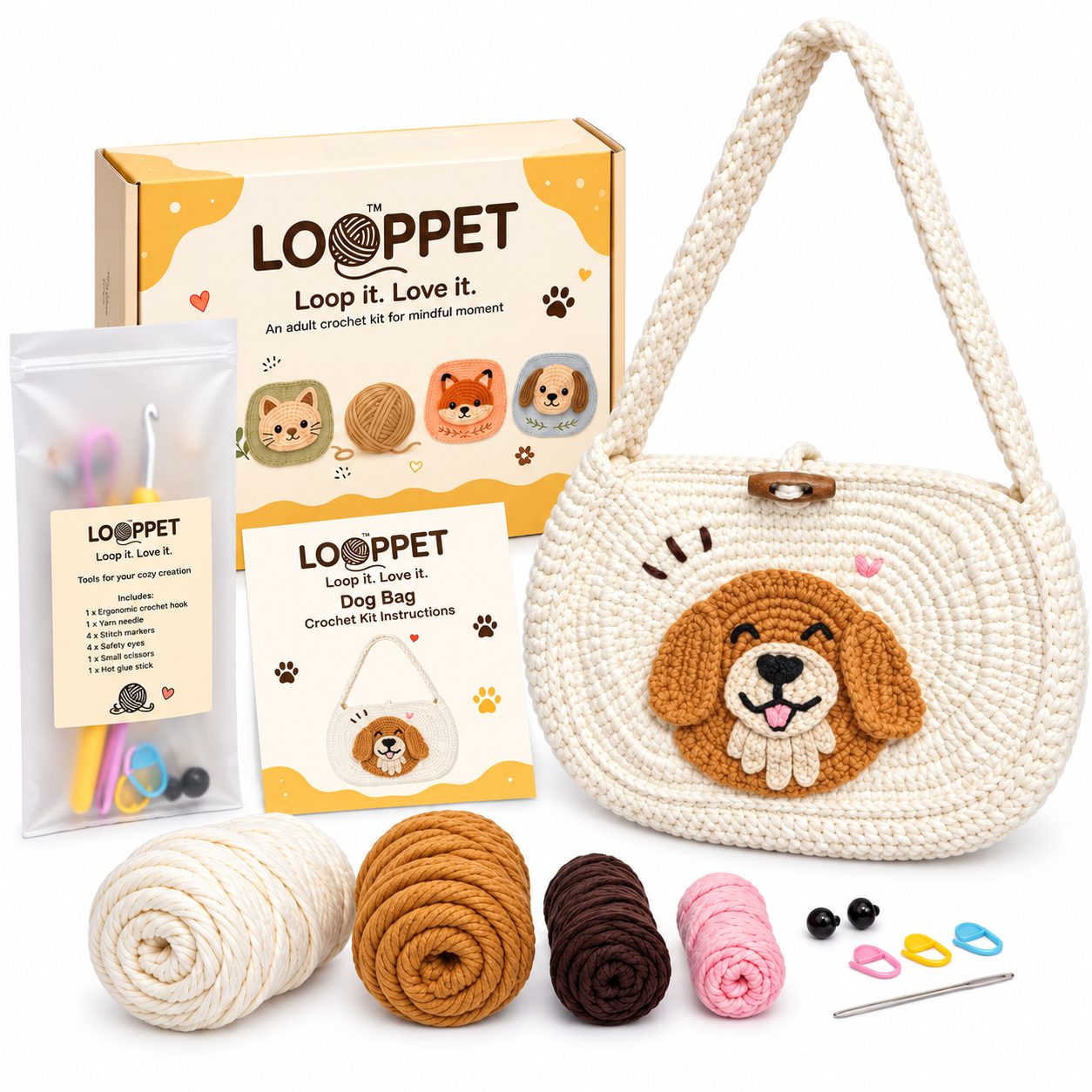 LOOPPET cream shoulder bag kit with a golden retriever face, yarn, tools, and printed guide