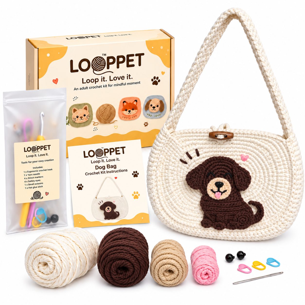 LOOPPET cream shoulder bag kit with a brown Labrador patch, yarn, tools, and printed guide